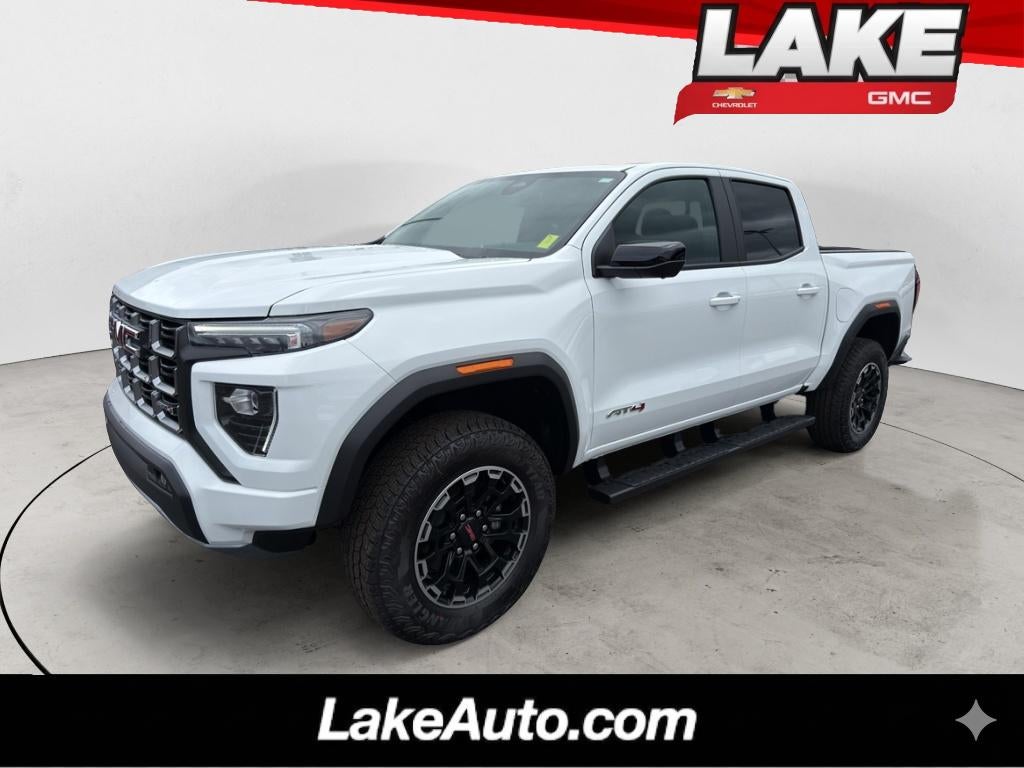 2026 GMC Canyon AT4 in Summit White — front three-quarter view