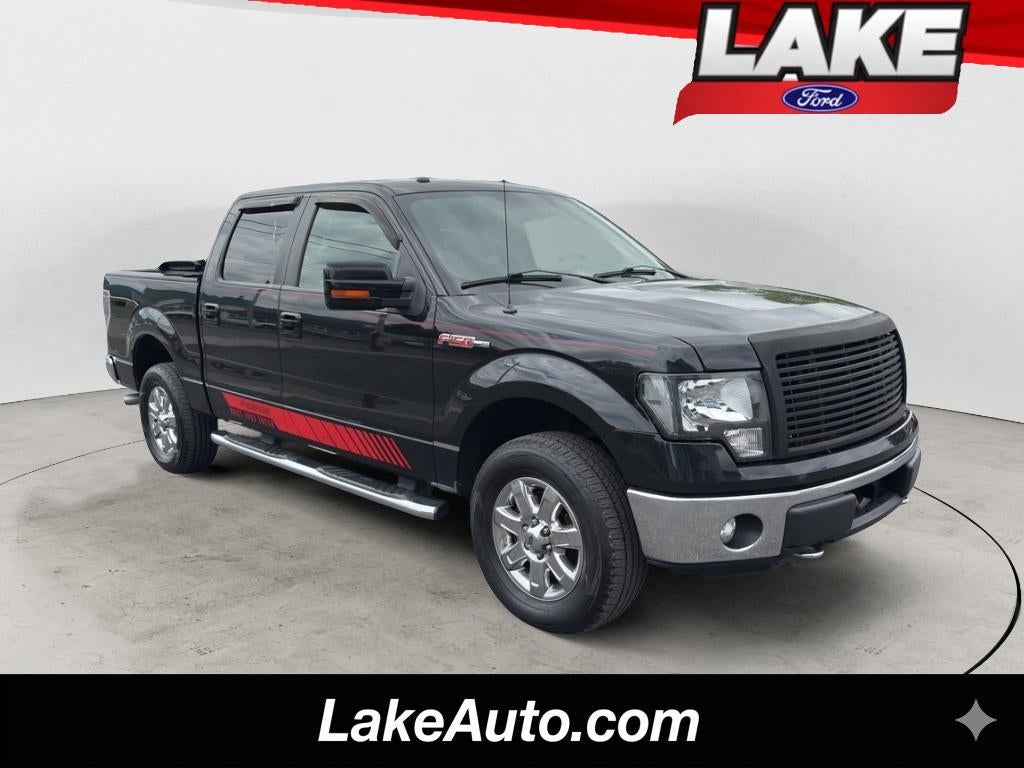 2014 Ford F-150 XLT in Tuxedo Black Metallic — front three-quarter view