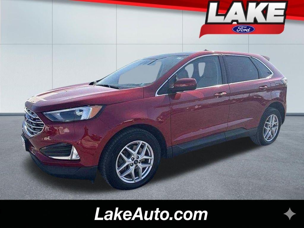 2022 Ford Edge SEL in Rapid Red Metallic Tinted Clearcoat — front three-quarter view